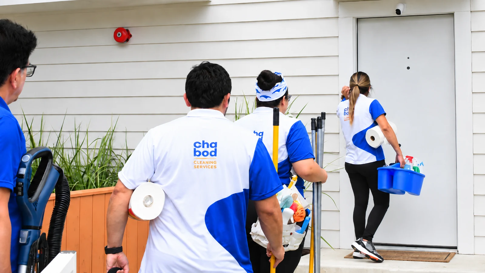 Chabod Cleaning Services team arriving at a returning client's San Antonio home with cleaning supplies
